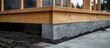 © Almahyra - House foundation construction, wooden beams, concrete blocks, outdoor