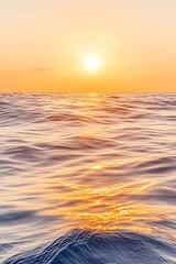 Wall Mural - serene sunrise over calm ocean waters, golden light reflecting on gentle waves