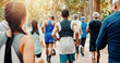 © Jessy/peopleimages.com - Running, marathon and back of people in park for charity event, race challenge and fitness. Training, fundraising competition and exercise with group of runners in nature for performance and sports