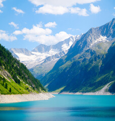 Wall Mural - azure lake and high mountain range in austria. mountain landscapes during summer. warm sunny weather