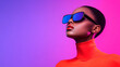 © Zatra - Portrait of a Woman with Short Hair Wearing Red Turtleneck and Blue Sunglasses Under Neon Lighting