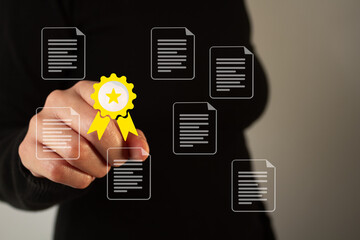 Poster - A person points to a yellow recognition icon with many paper icons. The icons are arranged in a grid, and the star is located in the center of the screen.