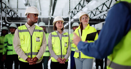 Poster - Man Providing Safety Training For Diverse Manufacturing Industry Employees