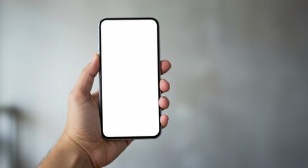 This image showcases a hand holding a smartphone with a clean, blank white screen, ideal for a mobile app or website mock-up, against a blurred backdrop