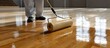 © duyina1990 - Polishing Wooden Floor with Roller in Gym