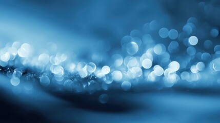 Poster - A serene blue abstract background featuring soft waves and beautiful bokeh effects, ideal for various uses.