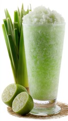 Poster - Refreshing lime slush in tall glass with lemongrass stalks and halved lime fruits on straw mat