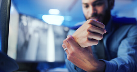 Poster - Wrist pain, security guard and hand with man, frustrated or cctv screen in night shift for safety. Arthritis, carpal tunnel or person with video surveillance in control room for protection agency