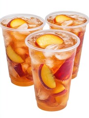 Poster - Refreshing peach iced tea in clear plastic cups filled with ice and peach slices on white background, a cool and sweet summer drink, studio shot