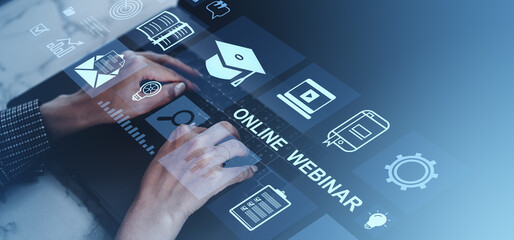 Fototapete - Hands typing on laptop with online webinar icons and digital education symbols..