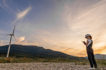 Poster - A highly skilled technician meticulously inspects various wind turbines at a renewable energy farm, employing advanced technology to ensure optimal performance and enhance overall sustainability