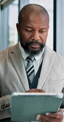 Poster - Business, black man and typing on tablet in office for company email, finance report and review budget. Mature accountant, digital and search for schedule update, online proposal and investment offer