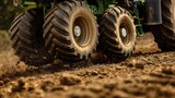 Closeup of Soil Compaction from Dual Tractor Tires Leaving Impressions in Bare Earth of an Empty Field Ready for Planting
