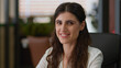 © Yuliia - Caucasian businesswoman online work laptop pc in office workplace employer business woman girl worker manager professional agent typing computer studying happy female worker smiling looking at camera
