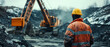 © aubriella - Worker Overlooking a Mining Site with Heavy Machinery