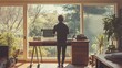 © Nazar - A person working on a standing desk in a modern home office with large windows and plenty of sunlight.
