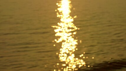 Wall Mural - Dramatic sea sunrise or sunset sky over sea. Burning sky and shining golden waves landscape,Beautiful waves crashing on sandy shore