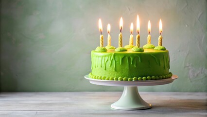 Aufkleber - A delightful lime green celebratory cake, adorned with lit candles, rests elegantly on a pale green cake stand against a soft green backdrop.