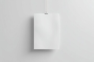 Poster - plain poster mockup hangs on bare wall offering minimalistic style and ample copy space