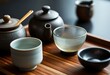 © KWY - wooden tray topped with bowls and cups