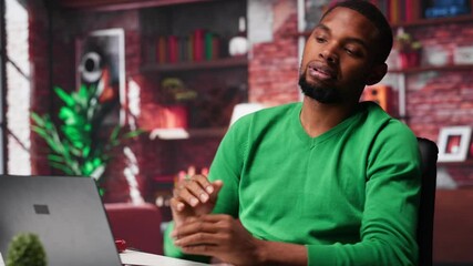 Poster - african american teleworker experiences lower back pain due to incorrect posture sitting at desk, de
