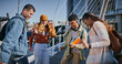 © Mitchell/peopleimages.com - University, friends and outdoor with laugh on urban bridge in New York with diversity and fun. College, people and group conversation on campus with smile and happy from education and learning