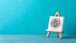 © raseldesigner93 - Tangled Thoughts on Canvas: A small canvas rests on an easel, showcasing a chaotic, tangled line drawing against a backdrop of vibrant blue.