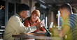 © Mitchell/peopleimages.com - Education, phone and tablet with student friends on campus together for development or learning. College, conversation or university with man and woman study group at school together for growth
