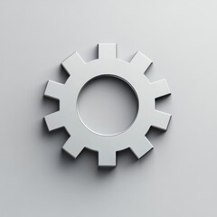 Poster - A sleek, minimalistic silver gear icon on a smooth gray background, symbolizing technology and engineering.