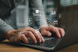 © Looker_Studio - Hand typing on laptop with AI productivity tools, task management icons, checklist system, and digital innovation concept for boosting business performance and operational efficiency.