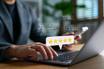 Fototapete - Businessman using laptop and smartphone with customer review rating, online feedback system, and user experience evaluation concept for digital marketing, service improvement, and brand reputation.