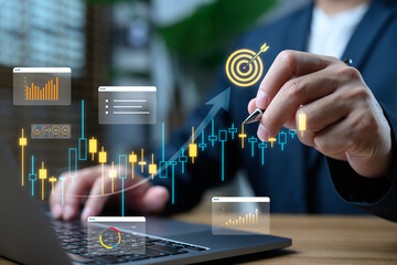 Poster - Businessman analyzing financial data on laptop with stock market charts, investment growth graphs, and business target concept for strategic planning and economic success.