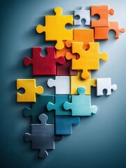 Poster - Puzzle Pieces Arranged in a Vibrant Composition Representing Teamwork and Collaboration in a Creative Environment