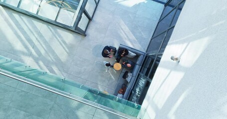 Poster - Collaboration, meeting and suitcase with business people in office from above for corporate planning. Brainstorming, conversation or strategy with professional employee team at work for travel