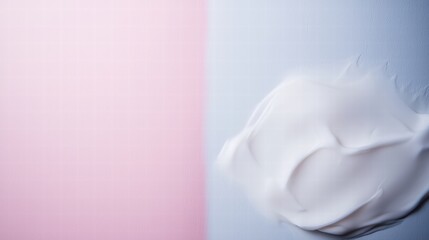 Poster - A smooth white cream spread on a beautiful pink and blue wall creating an elegant contrast