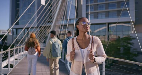 Poster - University, people and walking with back at campus for education, knowledge and travel to academy. Students, friends and woman by buildings on bridge for scholarship, learning and commute to class
