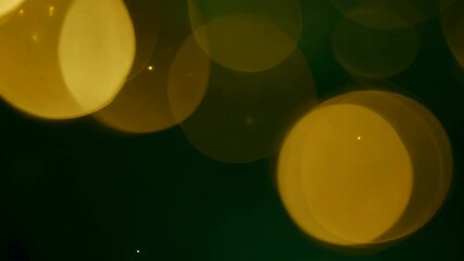 Poster - Beautiful Dark Green Christmas Background with Glittering Golden Light and Bokeh Effects
