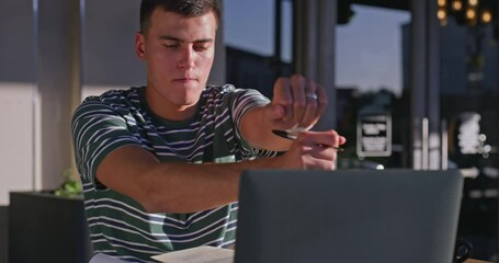 Fototapete - Student, man and dancing with laptop, reading and funny with learning, scholarship and development at campus. Person, computer and review notes for education, studying and research at university