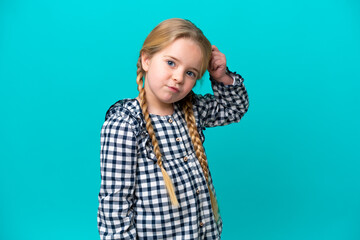 little caucasian girl isolated on blue background having doubts and with confuse face expression