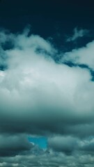 Wall Mural - Natural Background Sky. Moving Clouds. From Bold Blue Sky Day To Dark Heavy Rain Clouds Transition Timelapse. Rain Cloud Formation Time Lapse. Aquamarine Sky. Weather Forecast Concept. Bad Weather