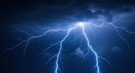 Poster - Dramatic view of lightning strikes illuminating a dark blue stormy sky with cloud formations above