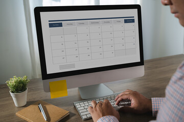 Poster - Event planner note on calendar businessman uses her smartphone and laptop to plan events, manage her schedule, and stay connected online