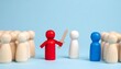 © photostockatinat - red wooden peg doll figure holding a sword facing a white peg doll figure with a crowd of beige peg dolls around them on a blue background