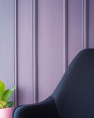 Poster - Cozy indoor space featuring a stylish chair next to a lush green plant in natural light setting