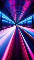 Wall Mural - A long tunnel with a bright blue and pink light. The tunnel seems to be a part of a train station or a subway system