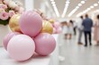© Leo Rohmann - Soft pastel decorative balloons arranged for event celebration in white bright hall with flowers and elegant interior setup ideal for romantic indoor occasions