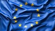 © Wannapha - European Union flag, blue fabric with yellow stars, symbolizes unity and collaboration, ideal for educational or political content.