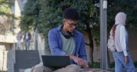 Aufkleber - Man, laptop and books for outdoor studying on campus, online assignment and research for project. Male person, student and textbook for education, e learning and knowledge for examination in New York