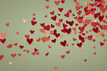 Poster - Red and pink hearts falling on a green background, creating a romantic and festive atmosphere, perfect for Valentine's Day designs or celebratory concepts