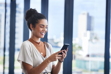 Leinwandbilder - Business, girl and happy with smartphone in office for networking, internet and research for trending content creation. Female person, cellphone and online in workplace for social media management.